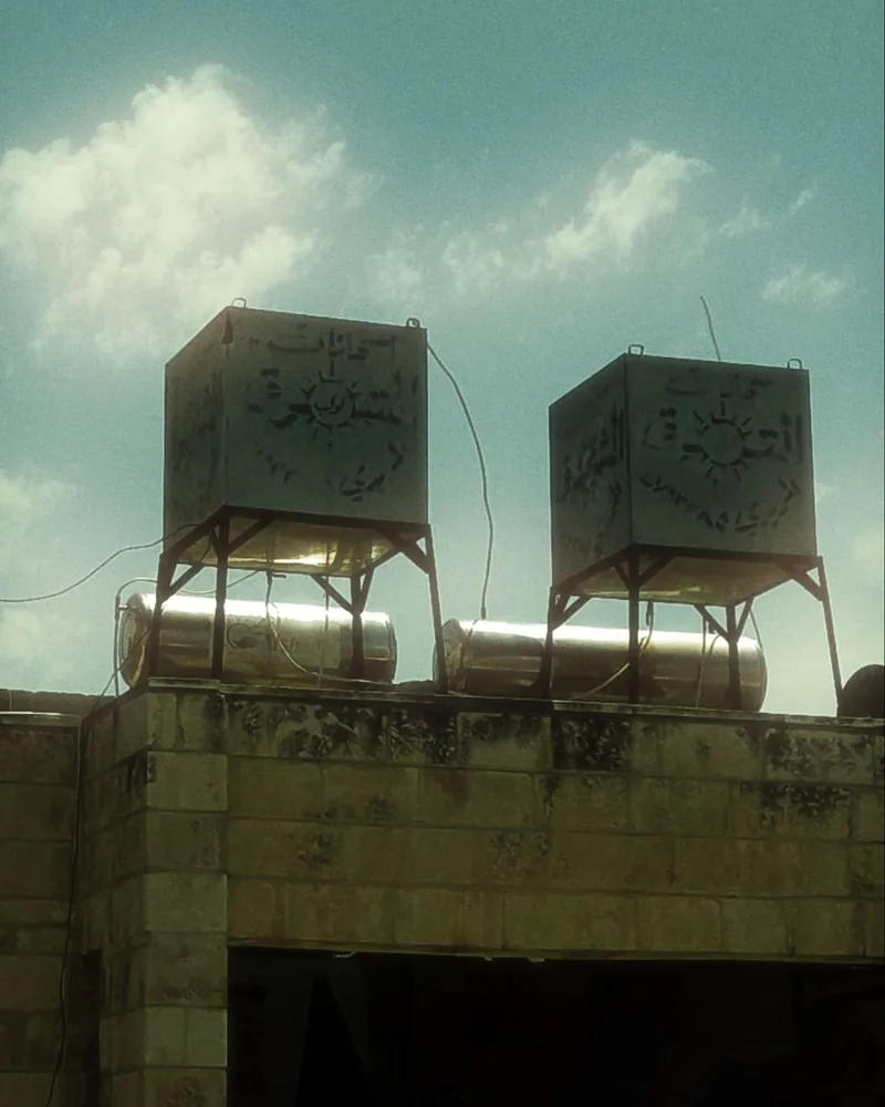 Roof-tank pump installation in Kuwait